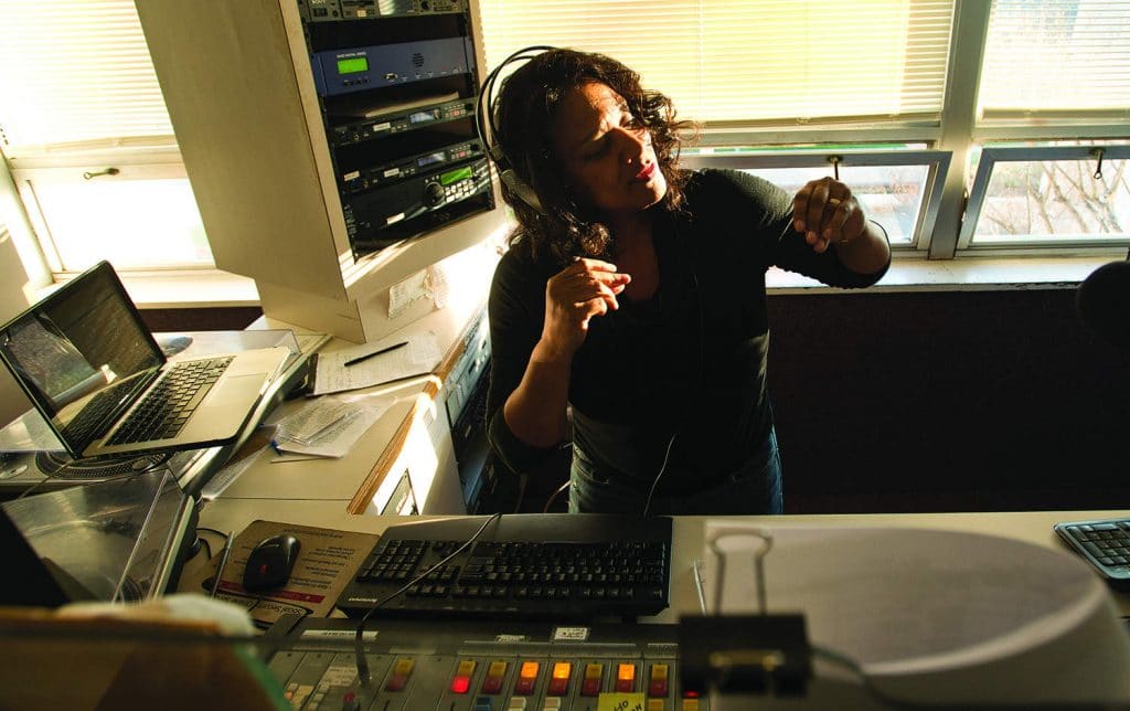 Sharon Berry-Vivian dances during her "Funk Friday" show on WSHA.